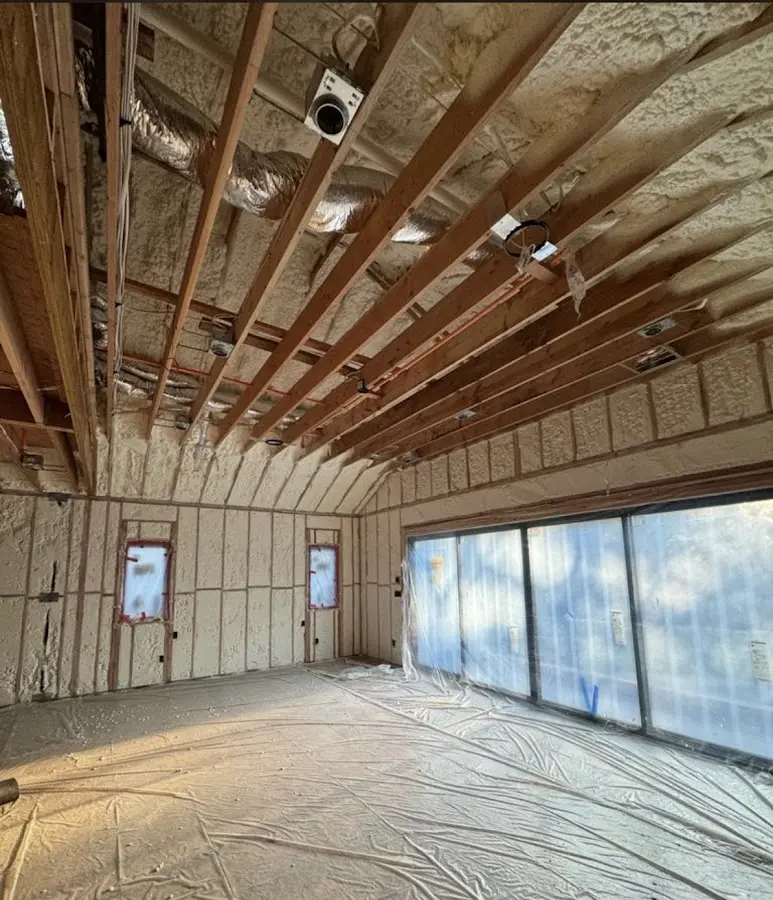 Interior walls and ceiling insulated with spray foam during new construction in Oskaloosa